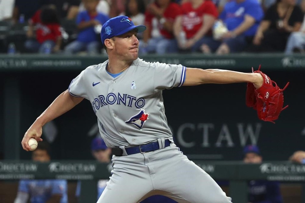 Toronto Blue Jays starting pitcher Chris Bassitt (40) delivers a pitch against the Texas Rangers in the first inning of a baseball game, Sunday, June 18, 2023, in Arlington, Texas. THE CANADIAN PRESS/AP, Richard W. Rodriguez
