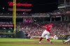 Cincinnati Reds' Christian Encarnacion-Strand hits a three-run home run against the San Francisco Giants during the fifth inning of a baseball game in Cincinnati, Tuesday, July 18, 2023. (AP Photo/Aaron Doster)