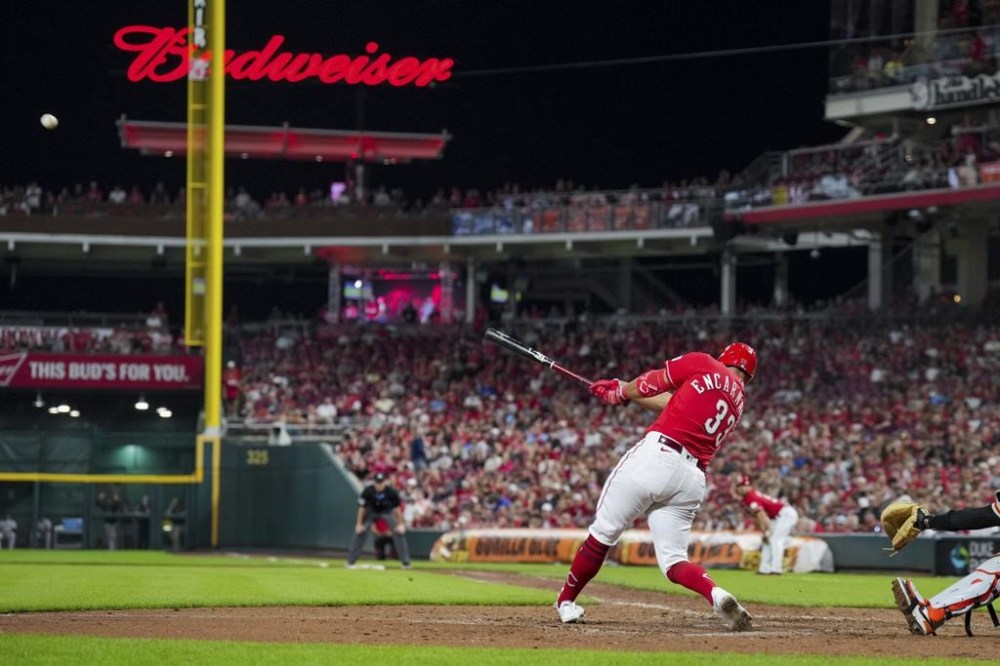 Cincinnati Reds' Christian Encarnacion-Strand hits a three-run home run against the San Francisco Giants during the fifth inning of a baseball game in Cincinnati, Tuesday, July 18, 2023. (AP Photo/Aaron Doster)