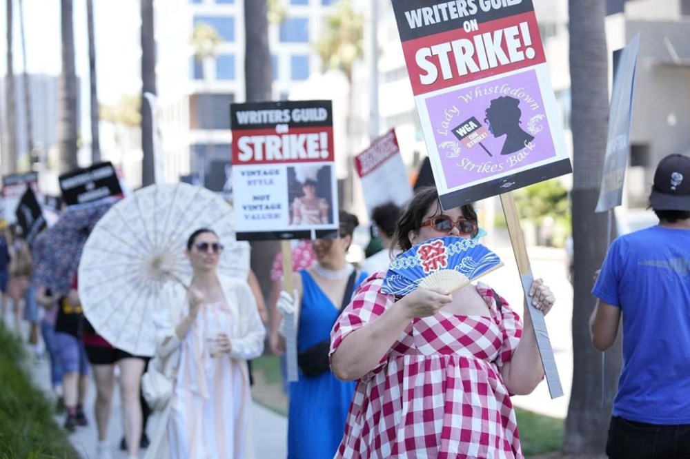 Picketers dressed as characters from