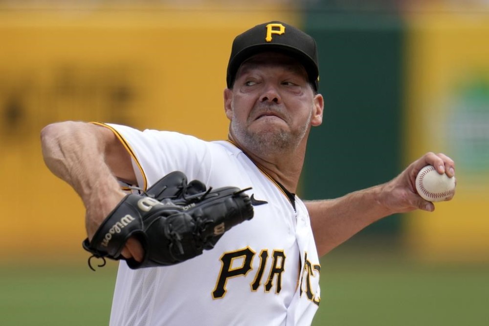 Pittsburgh Pirates starting pitcher Rich Hill delivers during the first inning of a baseball game against the Cleveland Guardians in Pittsburgh, Wednesday, July 19, 2023. (AP Photo/Gene J. Puskar)