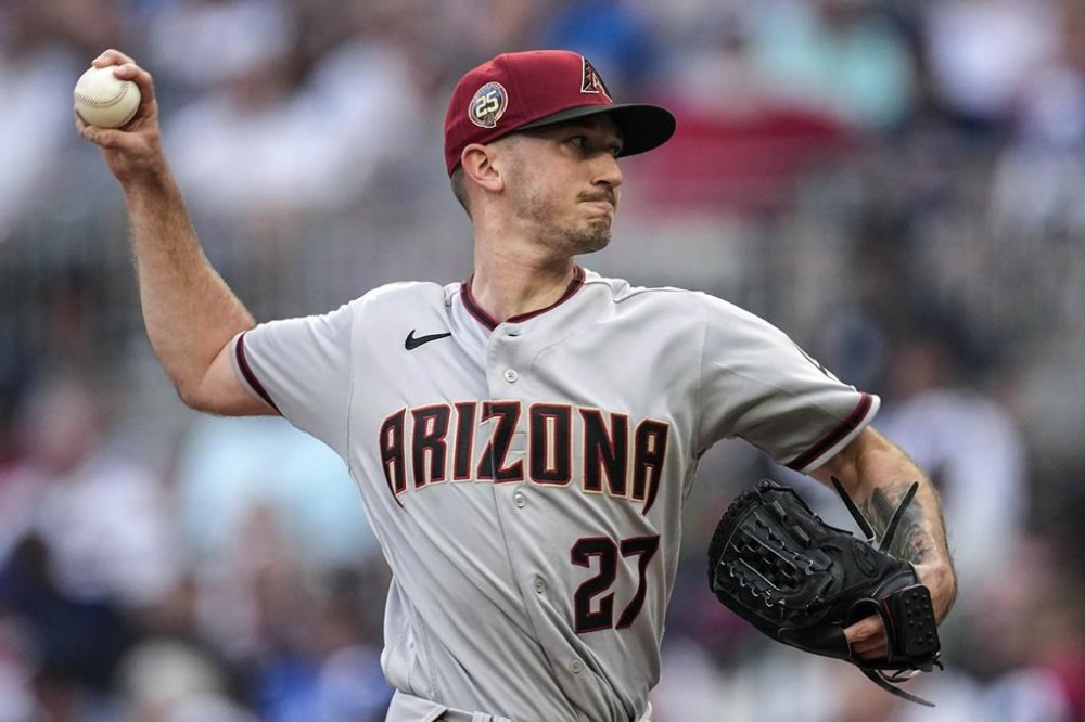 Arizona Diamondbacks starting pitcher Zach Davies (27) delivers in the first inning of a baseball game against the Atlanta Braves Tuesday, July 18, 2023, in Atlanta. (AP Photo/John Bazemore)