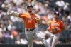 Houston Astros third baseman Alex Bregman throws to first base to put out Colorado Rockies' C.J. Cron in the second inning of a baseball game Wednesday, July 19, 2023, in Denver. (AP Photo/David Zalubowski)