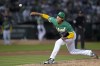Oakland Athletics pitcher Shintaro Fujinami throws to a Boston Red Sox batter during the seventh inning of a baseball game Tuesday, July 18, 2023, in Oakland, Calif. (AP Photo/Godofredo A. Vásquez)