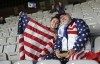 David Tritz, from Laguna Hills, California, and his daughter Erin Tritz, pose for a photo after taking their seats at the Women's World Cup soccer match between New Zealand and Norway in Auckland, New Zealand, Thursday, July 20, 2023. An estimated 20,000 Americans are coming to New Zealand for the Women's World Cup, and many have arrived in the days before the U.S. women's team plays its opener against Vietnam on Saturday (AP Photo/Rafaela Pontes)