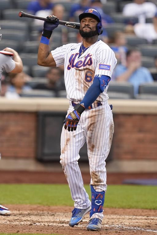New York Mets' Starling Marte reacts after striking out during the seventh inning of a baseball game against the Los Angeles Dodgers at Citi Field, Sunday, July 16, 2023, in New York. (AP Photo/Seth Wenig)