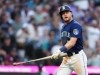 Seattle Mariners' Jarred Kelenic reacts after grounding out against the Minnesota Twins during the fifth inning of a baseball game Tuesday, July 18, 2023, in Seattle. (AP Photo/Lindsey Wasson)