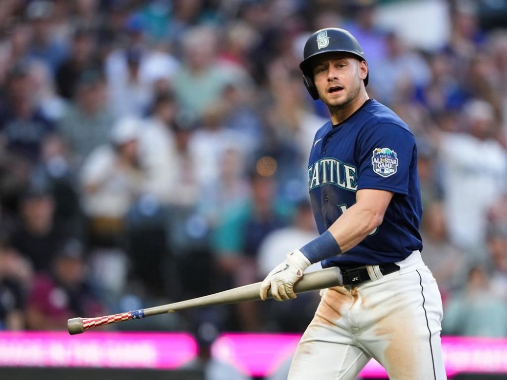 Seattle Mariners' Jarred Kelenic reacts after grounding out against the Minnesota Twins during the fifth inning of a baseball game Tuesday, July 18, 2023, in Seattle. (AP Photo/Lindsey Wasson)