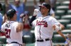 Atlanta Braves' Austin Riley, left, celebrates his three-run home run with Matt Olson in the eighth inning of a baseball game against the Arizona Diamondbacks Thursday, July 20, 2023, in Atlanta. (AP Photo/John Bazemore)