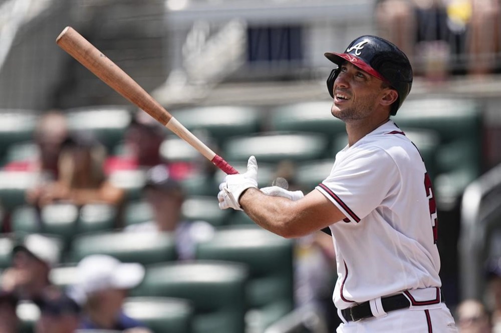 Atlanta Braves first baseman Matt Olson watches his two-run home run in the seventh inning of a baseball game against the Arizona Diamondbacks Thursday, July 20, 2023, in Atlanta. The Braves beat the Diamondbacks 7-5. (AP Photo/John Bazemore)