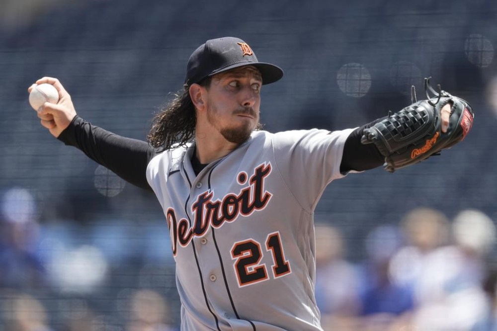 Detroit Tigers starting pitcher Michael Lorenzen throws during the first inning of a baseball game against the Detroit Tigers Thursday, July 20, 2023, in Kansas City, Mo. (AP Photo/Charlie Riedel)