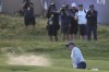 Northern Ireland's Rory McIlroy plays out of a bunker on the 18th green on the first day of the British Open Golf Championships at the Royal Liverpool Golf Club in Hoylake, England, Thursday, July 20, 2023. (AP Photo/Peter Morrison)