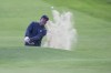 United States' Phil Mickelson plays out of a bunker on the 18th green on the first day of the British Open Golf Championships at the Royal Liverpool Golf Club in Hoylake, England, Thursday, July 20, 2023. (AP Photo/Kin Cheung)