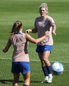 England defender Millie Bright gestures to a teammate during a team practice session in Brisbane, Australia, Friday, July 21, 2023. The European Champions will face Haiti in the opening match of the Group D at Brisbane Stadium Saturday. (AP Photo/Katie Tucker)