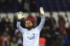 FILE - PSG's goalkeeper Gianluigi Donnarumma waves during warm up before the French League One soccer match between Paris Saint-Germain and Nantes at the Parc des Princes in Paris, Saturday, March 4, 2023. French police are investigating a violent armed robbery that targeted Paris Saint-Germain goalkeeper Gianluigi Donnarumma at his home. The Paris prosecutor's office said Friday July 21, 2023 the player was targeted overnight Thursday to Friday. (AP Photo/Aurelien Morissard, File)