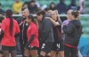 Canada's Christine Sinclair (12) is consoled by Shelina Zadorsky (4) as the players leave the field following a 0-0 draw against Nigeria in Group B soccer action at the FIFA Women's World Cup in Melbourne, Australia, Friday, July 21, 2023. THE CANADIAN PRESS/Scott Barbour
