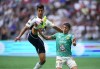 Vancouver Whitecaps' Mathias Laborda, left, knocks down a pass intended for Club Leon's Omar Fernandez with his foot during the first half of a Leagues Cup soccer match in Vancouver, on Friday, July 21, 2023. THE CANADIAN PRESS/Darryl Dyck