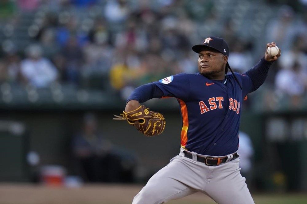 Houston Astros pitcher Framber Valdez throws to an Oakland Athletics batter during the first inning of a baseball game Friday, July 21, 2023, in Oakland, Calif. (AP Photo/Godofredo A. Vásquez)