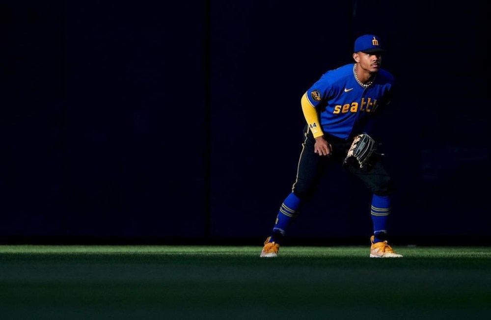 Seattle Mariners center fielder Julio Rodriguez looks to the infield during the first inning of a baseball game against the Toronto Blue Jays, Friday, July 21, 2023, in Seattle. (AP Photo/Lindsey Wasson)