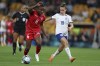 Haiti's Melchie Dumornay competes for the ball with England's Ella Toone during the Women's World Cup Group D soccer match between England and Haiti in Brisbane, Australia, Saturday, July 22, 2023. (AP Photo/Katie Tucker)