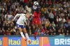 England's Alex Greenwood, left, battles for the ball with Haiti's Louis Batcheba during the Women's World Cup Group D soccer match between England and Haiti in Brisbane, Australia, Saturday, July 22, 2023. (AP Photo/Tertius Pickard)
