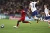 Haiti's Melchie Dumornay competes for the ball with England's Lucy Bronze during the Women's World Cup Group D soccer match between England and Haiti in Brisbane, Australia, Saturday, July 22, 2023. (AP Photo/Katie Tucker)