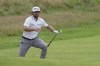 United States' Cameron Young gets out of a bunker on the 18th green during the third day of the British Open Golf Championships at the Royal Liverpool Golf Club in Hoylake, England, Saturday, July 22, 2023. (AP Photo/Kin Cheung)