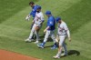 New York Mets' Luis Guillorme (13) limps off the field after being injured while fielding a single by Boston Red Sox's Rafael Devers during the sixth inning in the continuation of a suspended baseball game, Saturday, July 22, 2023, in Boston. The game was suspended the night before due to heavy rain. (AP Photo/Michael Dwyer)