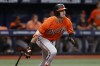 Baltimore Orioles' Ryan O'Hearn watches the ball after hitting an RBI single against the Tampa Bay Rays during the ninth inning of a baseball game Saturday, July 22, 2023, in St. Petersburg, Fla. (AP Photo/Scott Audette)