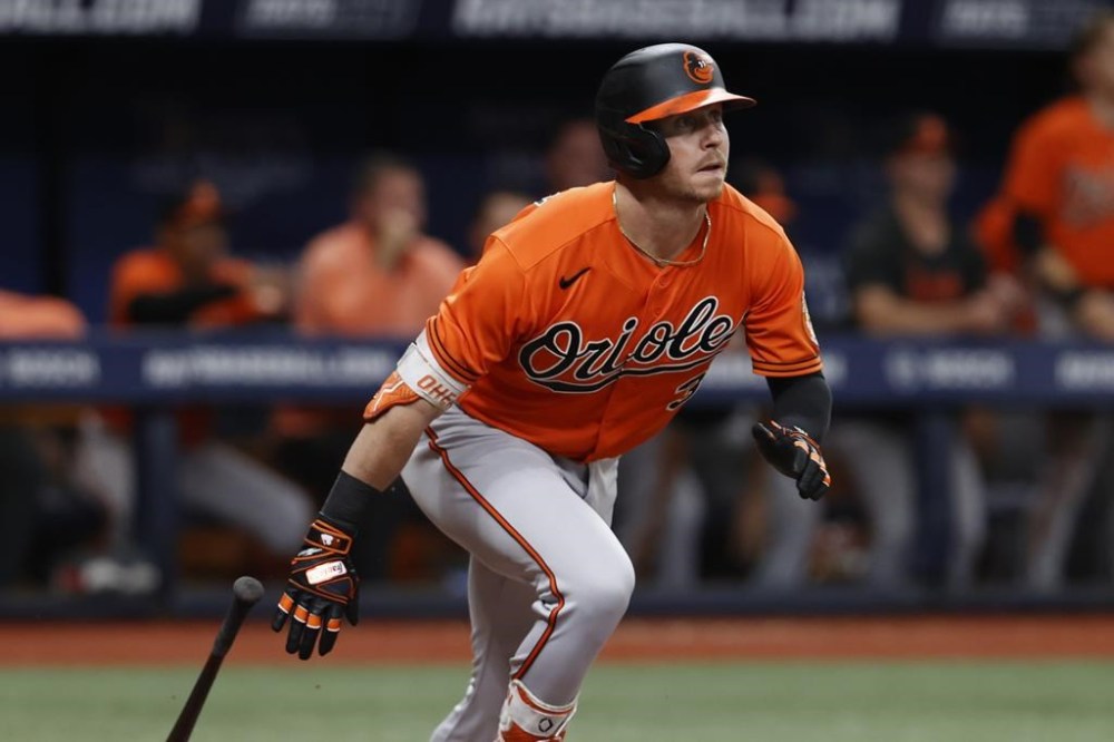 Baltimore Orioles' Ryan O'Hearn watches the ball after hitting an RBI single against the Tampa Bay Rays during the ninth inning of a baseball game Saturday, July 22, 2023, in St. Petersburg, Fla. (AP Photo/Scott Audette)