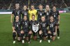 New Zealand players pose for a group photo before the Women's World Cup soccer match between New Zealand and Norway in Auckland, New Zealand, Thursday, July 20, 2023. (AP Photo/Andrew Cornaga)