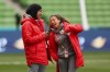 Morocco's Nouhaila Benzina, left, and Fatima Gharbi walk around the ground during a familiarization tour ahead of their Women's World Cup Group H match against Germany in Melbourne, Australia, Sunday, July 23, 2023. When Benzina steps onto the pitch Monday evening, she will be first player to compete in a senior-level FIFA Women's World Cup wearing a hijab. (AP Photo/Victoria Adkins)