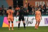 Netherlands' Danielle Van de Donk, right, receives a yellow card during the second half of the FIFA Women's World Cup Group E soccer match between the Netherlands and Portugal in Dunedin, New Zealand, Sunday, July 23, 2023. (AP Photo/Alessandra Tarantino)