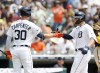 Detroit Tigers' Spencer Torkelson, right, celebrates with Kerry Carpenter (30) after hitting solo home run against the San Diego Padres during the first inning of a baseball game Sunday, July 23, 2023,, in Detroit. (AP Photo/Duane Burleson)
