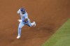 Texas Rangers' Ezequiel Duran runs the bases after his double during the fourth inning of a baseball game against the Los Angeles Dodgers, Sunday, July 23, 2023, in Arlington, Texas. (AP Photo/Sam Hodde)