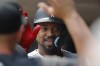 Chicago White Sox's Eloy Jimenez celebrates his solo home run against the Minnesota Twins in the second inning of a baseball game, Sunday, July 23, 2023, in Minneapolis. (AP Photo/Bruce Kluckhohn)