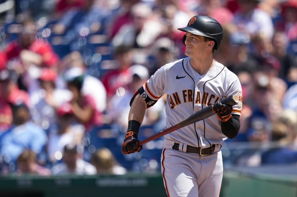 San Francisco Giants' Mike Yastrzemski reacts after striking out during the fourth inning of a baseball game against the Washington Nationals at Nationals Park, Sunday, July 23, 2023, in Washington. (AP Photo/Alex Brandon)