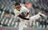 FILE - Colorado Rockies relief pitcher Pierce Johnson throws in the ninth inning of a baseball game Thursday, May 25, 2023, in Denver. The NL-leading Atlanta Braves traded for a pair of relievers Monday, July 24, acquiring right-hander Pierce Johnson from Colorado and lefty Taylor Hearn from Texas. The moves could help Atlanta (64-34) fortify its bullpen for the final two months of the season.(AP Photo/David Zalubowski, File)