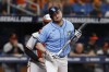 Tampa Bay Rays' Luke Raley walks back to the dugout after striking out against the Baltimore Orioles during the ninth inning of a baseball game, Sunday, July 23, 2023, in St. Petersburg, Fla. (AP Photo/Scott Audette)