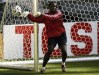 FILE - Goalkeeper Shaka Hislop, of Trinidad and Tobago, flicks the ball during the official training session at FIFA World Cup Stadium in Dortmund, Germany, June 9, 2006. Soccer analyst and former Premier League goaltender Hislop said Monday, July 24, 2023, he is seeking “the best medical opinion,” he can get, one day after collapsing on the set of ESPN’s pregame show ahead of the friendly between Real Madrid and AC Milan at the Rose Bowl. Neither Hislop not ESPN has given a cause for the collapse. (AP Photo/Eugene Hoshiko, File)