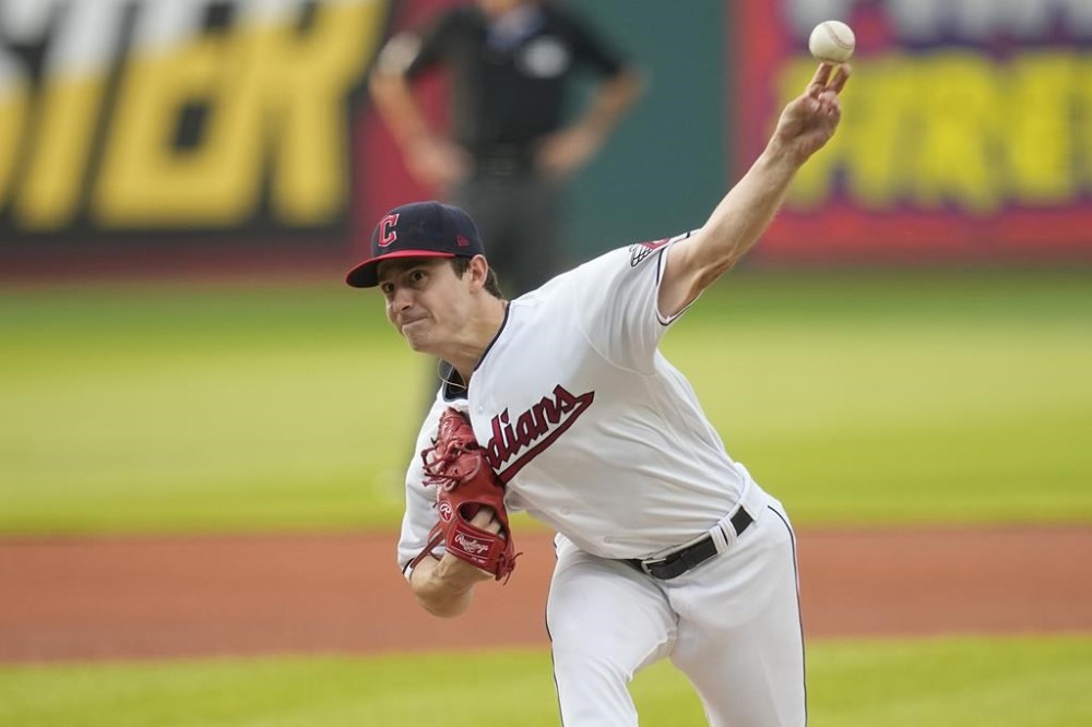 Cleveland Guardians' Logan Allen pitches in the first inning of a baseball game against the Kansas City Royals, Monday, July 24, 2023, in Cleveland. (AP Photo/Sue Ogrocki)