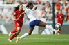 United States' Naomi Girma, front, controls the ball as Vietnam's Nhu Huynh (9) chases during the first half of the Women's World Cup Group E soccer match between the United States and Vietnam at Eden Park in Auckland, New Zealand, Saturday, July 22, 2023. (AP Photo/Abbie Parr)