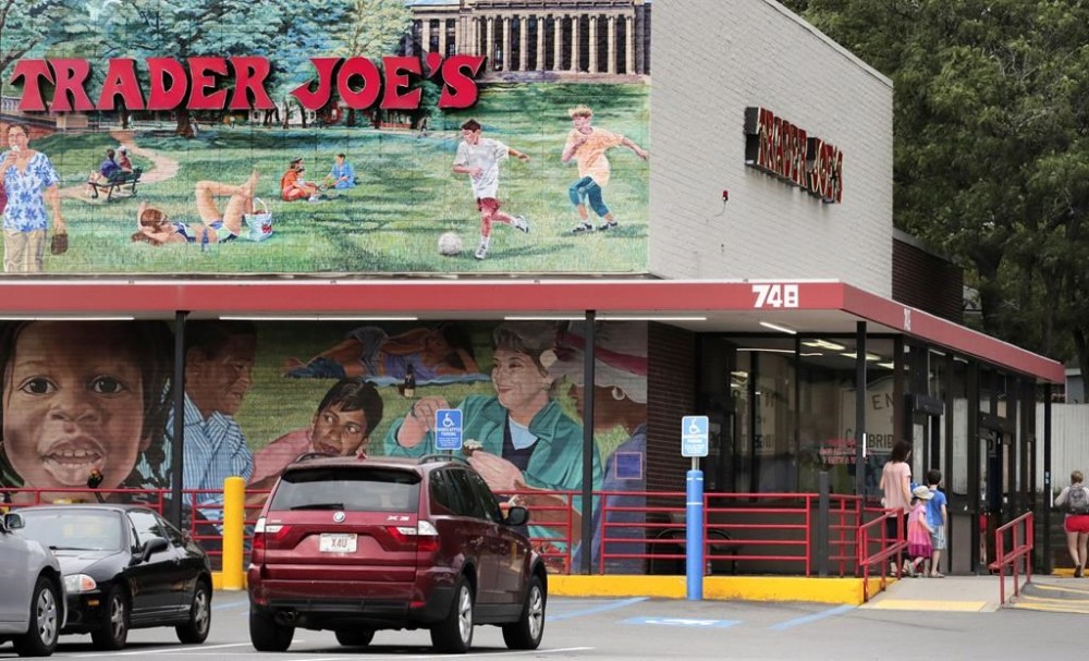 FILE - Customers walk to a Trader Joe's market, Aug. 13, 2019, in Cambridge, Mass. Trader Joe’s is recalling two of its cookie products because they may contain rocks, the grocery chain announced Friday, July 21, 2023. (AP Photo/Charles Krupa, File)