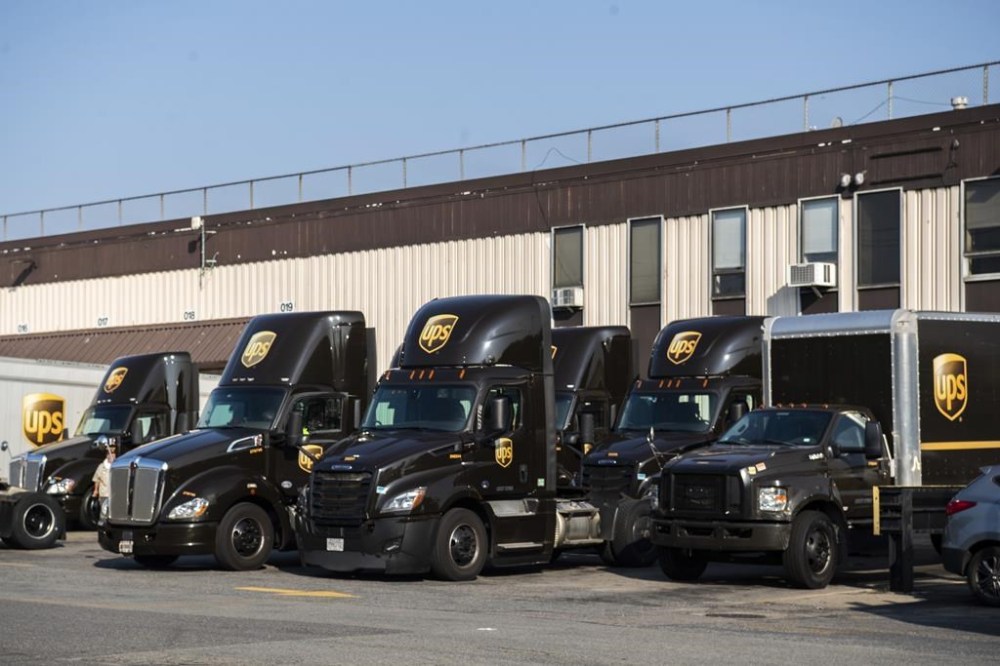 FILE - View of a UPS facility on Thursday, July 6, 2023, in the Brooklyn borough of New York. UPS has reached a contract agreement with its 340,000-person strong union Tuesday, July 25, averting a strike that had the potential to disrupt logistics nationwide for businesses and households alike. (AP Photo/Brittainy Newman, File)