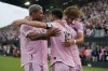 Inter Miami forward Lionel Messi (10) is congratulated by his teammates after scoring a goal during the first half of a Leagues Cup soccer match against Atlanta United, Tuesday, July 25, 2023, in Fort Lauderdale, Fla. (AP Photo/Lynne Sladky)