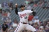 Minnesota Twins starting pitcher Pablo Lopez throws during the first inning of a baseball game against the Seattle Mariners, Tuesday, July 25, 2023, in Minneapolis. (AP Photo/Stacy Bengs)