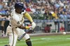 Milwaukee Brewers' Andruw Monasterio hits a single during the fourth inning of a baseball game against the Cincinnati Reds Tuesday, July 25, 2023, in Milwaukee. (AP Photo/Morry Gash)