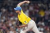 Boston Red Sox pitcher Nick Pivetta delivers to an Atlanta Braves batter during the third inning of a baseball game at Fenway Park, Tuesday, July 25, 2023, in Boston. (AP Photo/Charles Krupa)