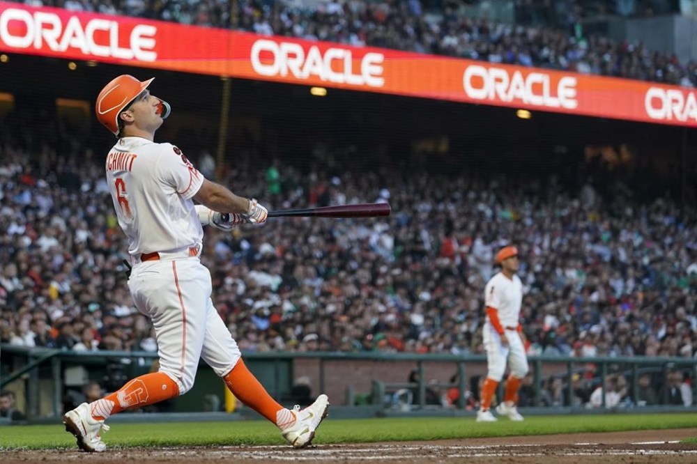 San Francisco Giants' Casey Schmitt watches his sacrifice fly during the fifth inning of a baseball game against the Oakland Athletics, Tuesday, July 25, 2023, in San Francisco. (AP Photo/Godofredo A. Vásquez)