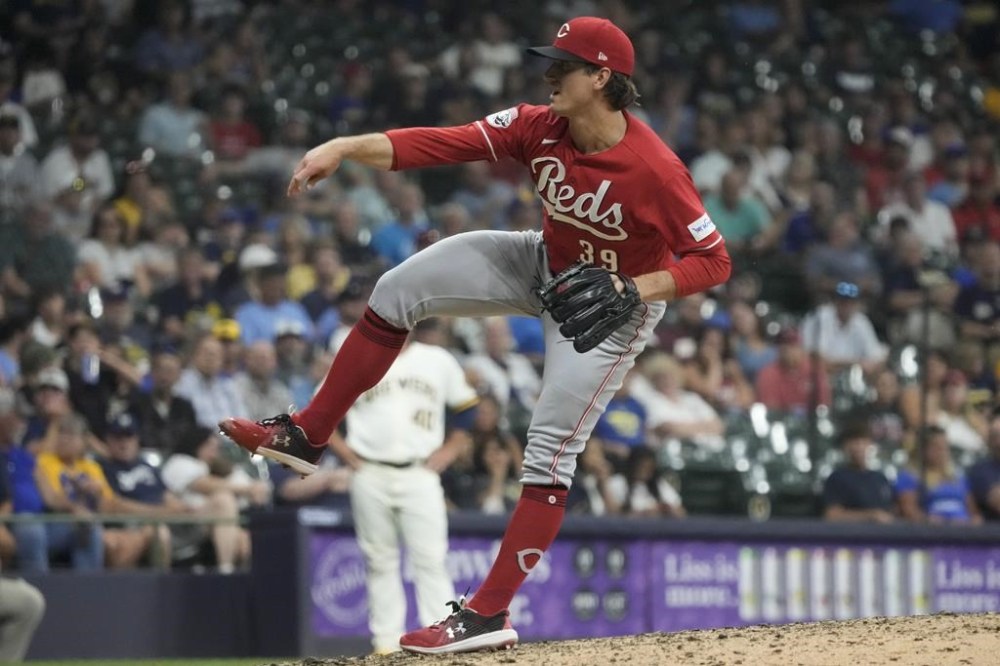 Cincinnati Reds' Lucas Sims throws during the eighth inning of a baseball game against the Milwaukee Brewers Tuesday, July 25, 2023, in Milwaukee. (AP Photo/Morry Gash)